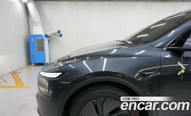 Tesla Model Y — Фото автомобиля 5