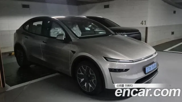 Tesla Model Y — Фото автомобиля 3