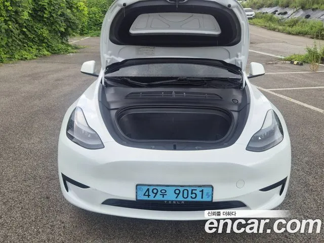 Tesla Model Y — Фото автомобиля 6