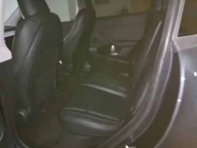 Tesla Model Y — Фото автомобиля 16