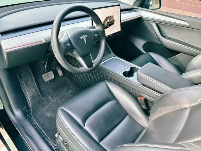 Tesla Model Y — Фото автомобиля 4