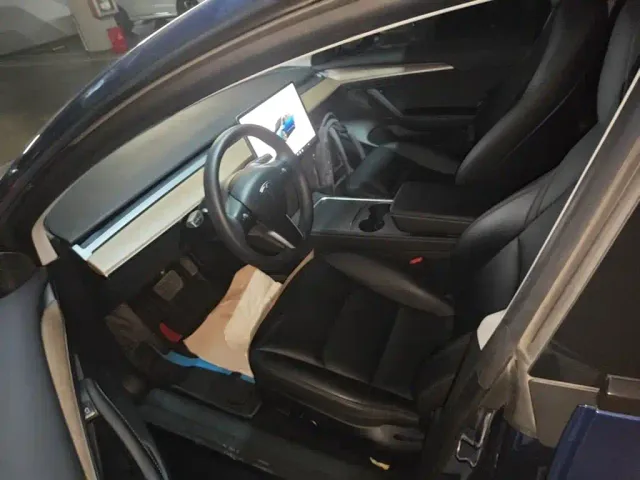 Tesla Model 3 — Фото автомобиля 15