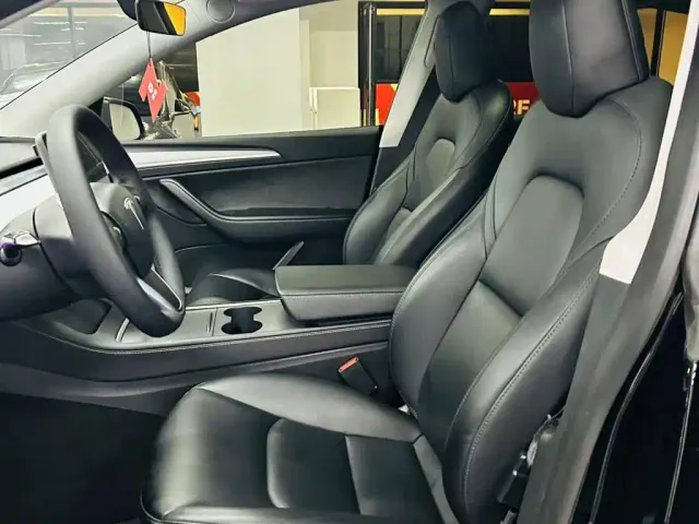 Tesla Model Y — Фото автомобиля 7