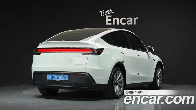 Tesla Model Y — Фото автомобиля 2