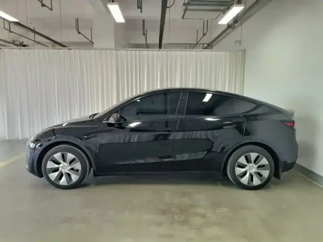 Tesla Model Y — Фото автомобиля 2