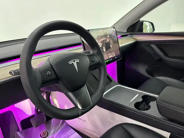 Tesla Model Y — Фото автомобиля 14