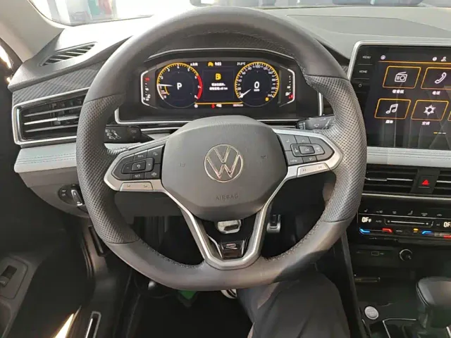Volkswagen Tiguan L — Фото автомобиля 10