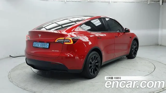 Tesla Model Y — Фото автомобиля 4