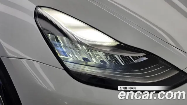 Tesla Model Y — Фото автомобиля 7