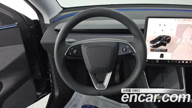 Tesla Model Y — Фото автомобиля 13