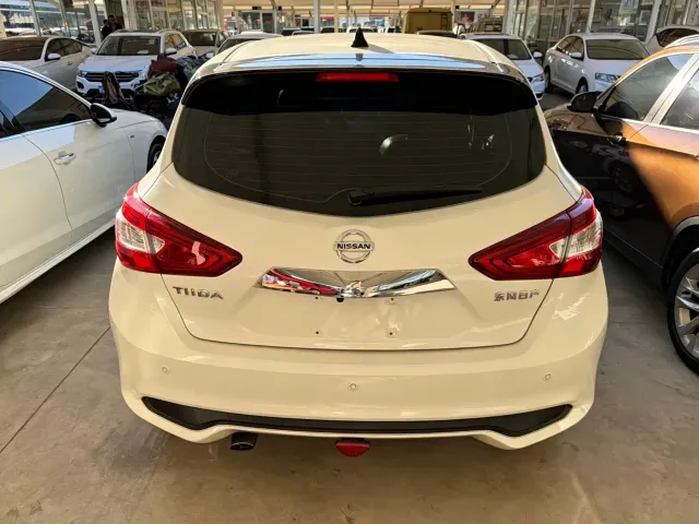 Nissan Tiida — Фото автомобиля 15