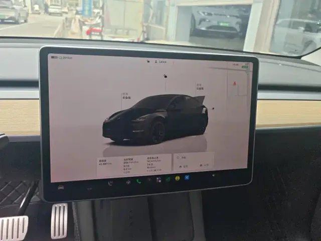 Tesla Model Y — Фото автомобиля 14