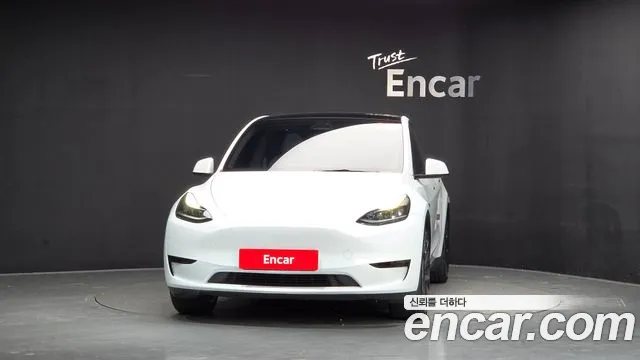 Tesla Model Y — Фото автомобиля 3