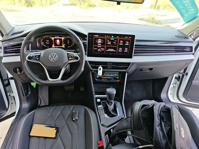 Volkswagen Tiguan L — Фото автомобиля 9
