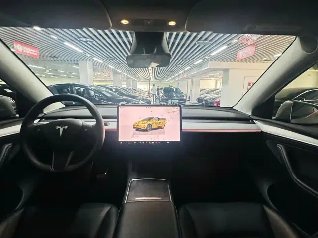 Tesla Model Y — Фото автомобиля 8