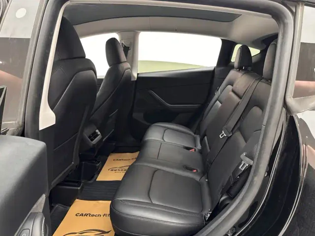Tesla Model Y — Фото автомобиля 9