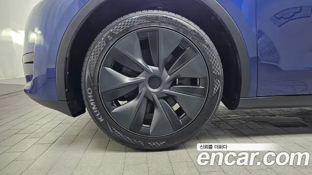 Tesla Model Y — Фото автомобиля 5
