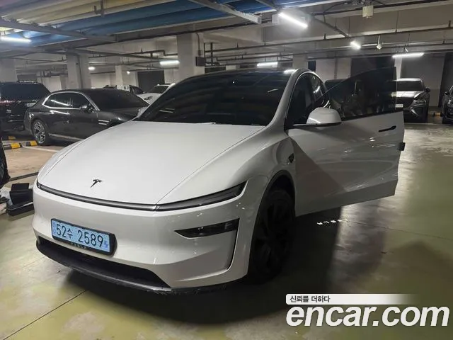 Tesla Model Y — Фото автомобиля 2