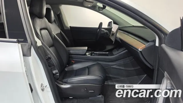 Tesla Model Y — Фото автомобиля 26