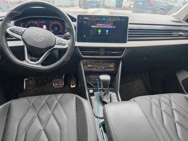 Volkswagen Tiguan L — Фото автомобиля 5