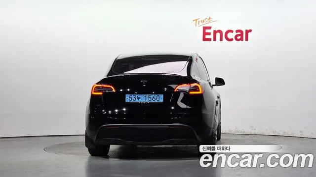 Tesla Model Y — Фото автомобиля 4