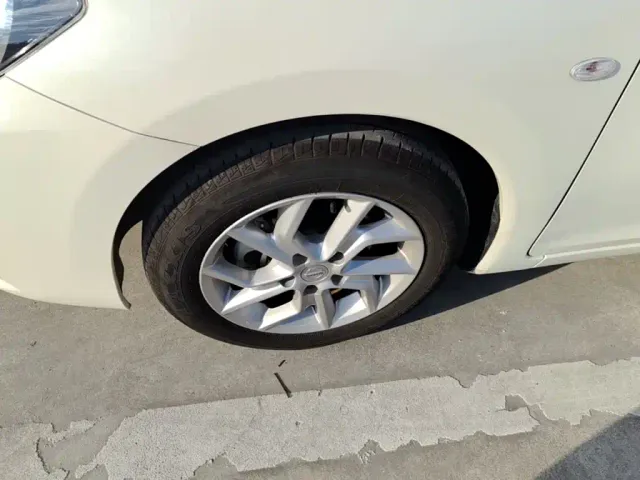 Nissan Tiida — Фото автомобиля 22