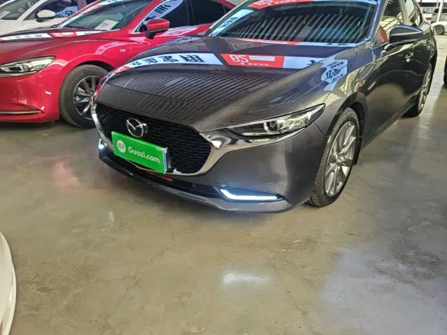 Mazda Axela — Фото автомобиля 23
