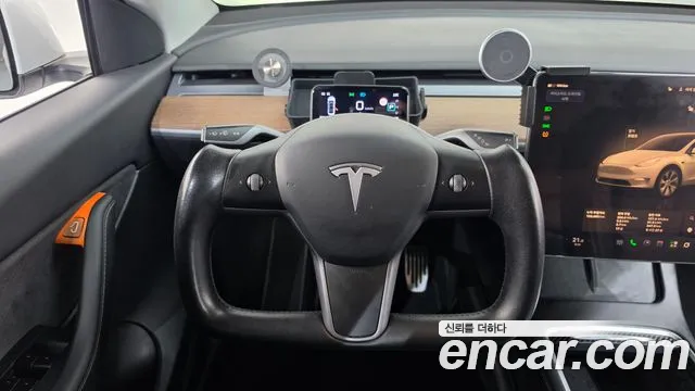 Tesla Model Y — Фото автомобиля 13