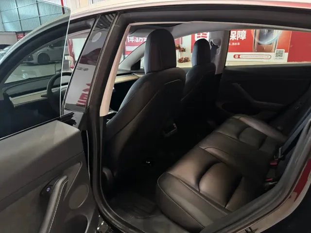Tesla Model 3 — Фото автомобиля 9