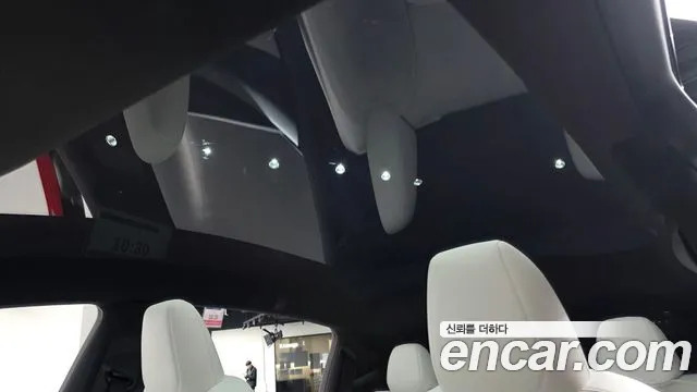 Tesla Model Y — Фото автомобиля 25