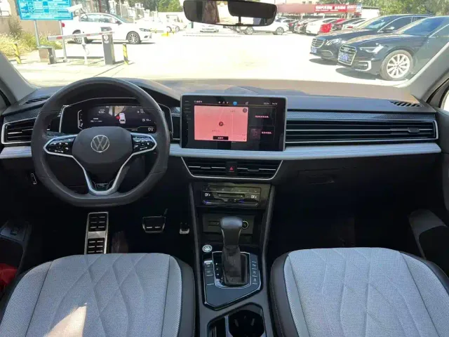 Volkswagen Tiguan L — Фото автомобиля 7