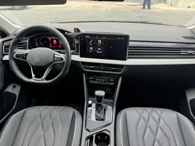 Volkswagen Tiguan L — Фото автомобиля 6