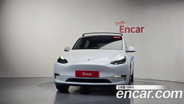 Tesla Model Y — Фото автомобиля 3