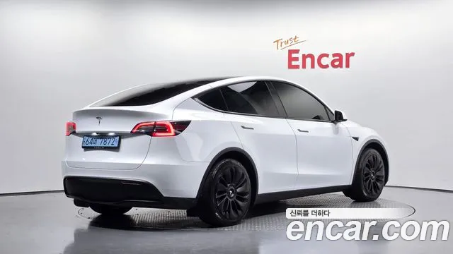 Tesla Model Y — Фото автомобиля 2