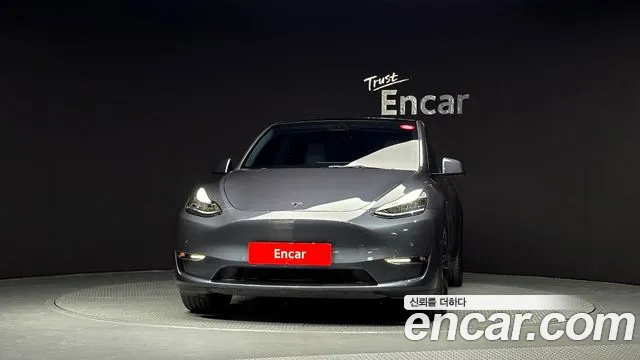 Tesla Model Y — Фото автомобиля 3