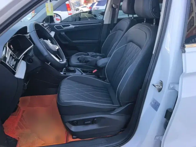 Volkswagen Tiguan L — Фото автомобиля 14