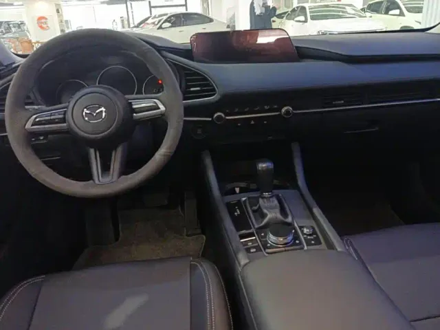 Mazda Axela — Фото автомобиля 12