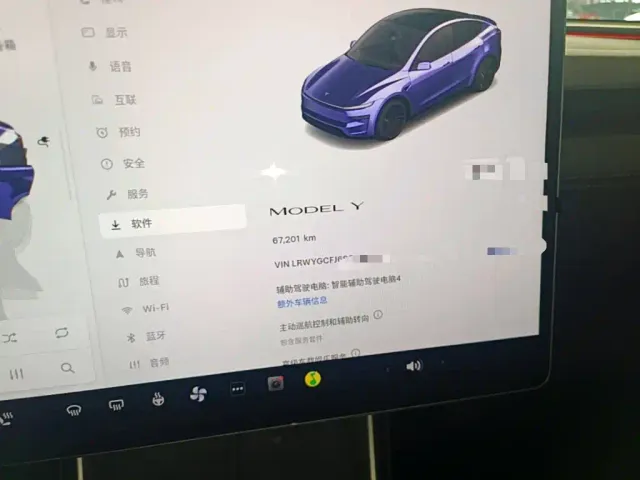Tesla Model Y — Фото автомобиля 11