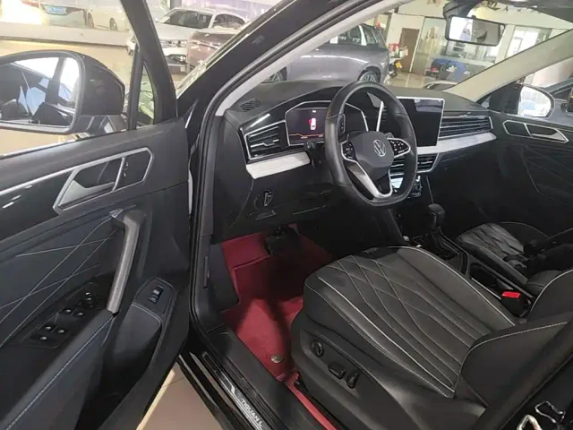 Volkswagen Tiguan L — Фото автомобиля 15