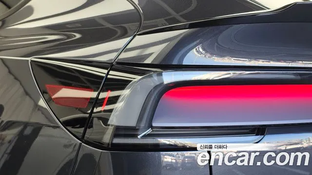 Tesla Model Y — Фото автомобиля 8