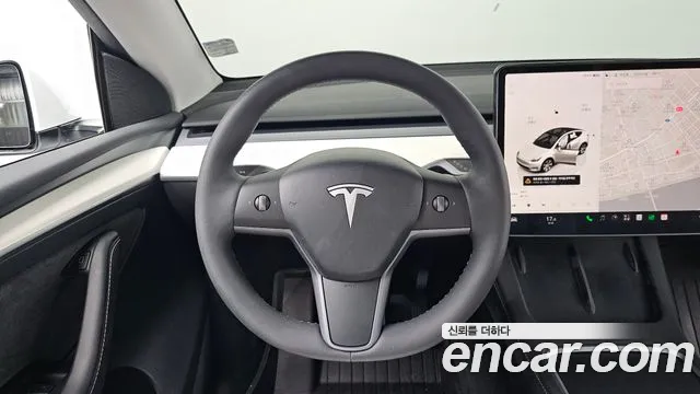 Tesla Model Y — Фото автомобиля 12