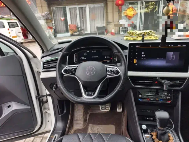 Volkswagen Tiguan L — Фото автомобиля 2