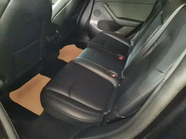 Tesla Model Y — Фото автомобиля 16