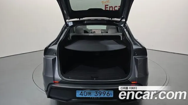 Tesla Model Y — Фото автомобиля 24