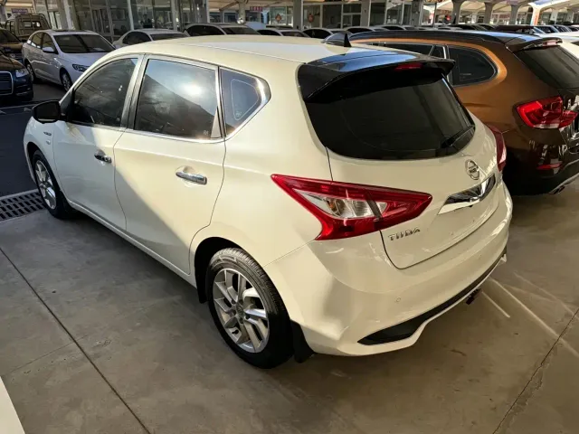 Nissan Tiida — Фото автомобиля 14
