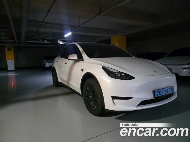 Tesla Model Y — Фото автомобиля 3
