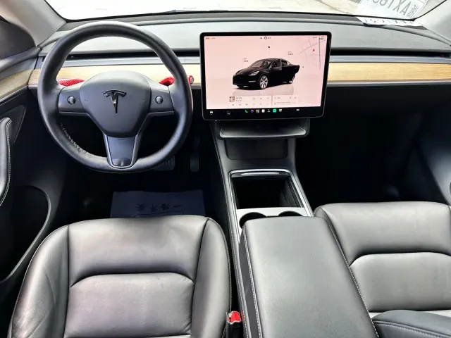 Tesla Model Y — Фото автомобиля 11