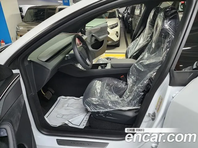 Tesla Model Y — Фото автомобиля 7