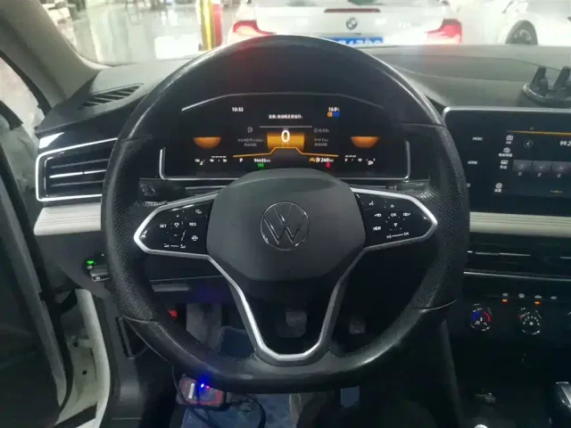 Volkswagen Tiguan L — Фото автомобиля 7