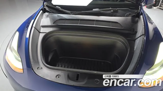Tesla Model Y — Фото автомобиля 5